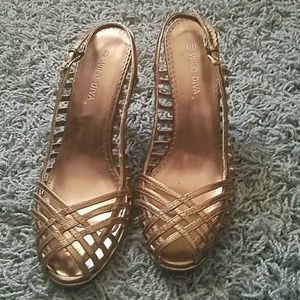 Lightly used gold metallic heels